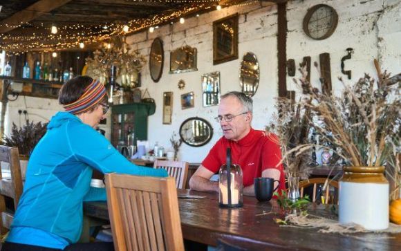 Two people relaxing at Pattys Barn Wildey Media